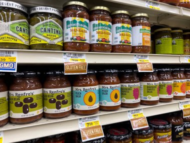 Seattle, WA USA - circa november 2022: Close up view of jarred salsas for sale inside a grocery store