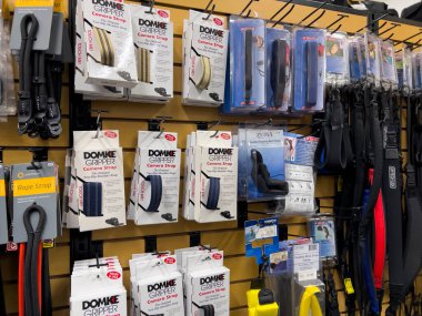 Kenmore, WA USA - circa December 2022: Close up view of camera straps for sale inside Kenmore Camera shop.