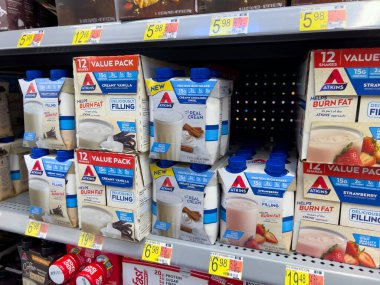 Monroe, WA USA - circa December 2022: Close up view of Atkins meal replacement shakes for sale inside a Walmart store.