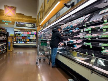 Mill Creek, WA USA - circa December 2022: Wide view of people shopping inside a Sprouts Farmers Market grocery store.