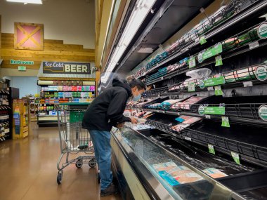 Mill Creek, WA USA - circa December 2022: Wide view of people shopping inside a Sprouts Farmers Market grocery store.