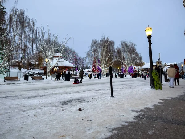 Leavenworth, WA USA - circa December 2022: Wide view of people shopping in the downtown area of Leavenworth.