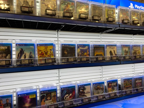 stock image Lynnwood, WA USA - circa December 2022: Close up view of Playstation games for sale inside a Best Buy retail store.