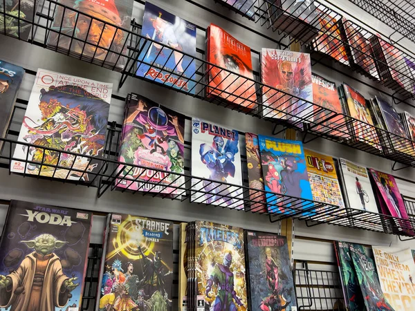 Lynnwood, WA USA - circa January 2023: Close up view of popular comics for sale inside a Phantom Zone Comics store.