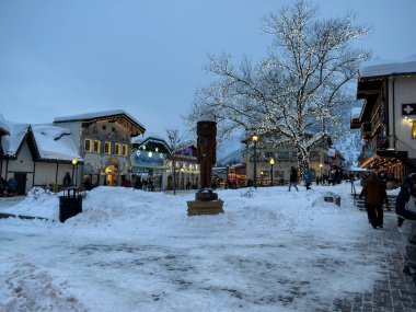 Leavenworth, WA USA - circa December 2022: View of a statue in downtown Leavenworth at night