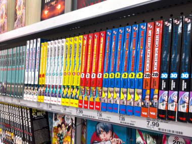 Lynnwood, WA USA - circa February 2023: Selective focus on manga for sale inside a Target retail store. clipart