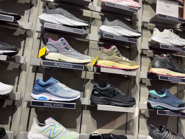 stock image Lynnwood, WA USA - circa March 2023: Close up view of running shoes for sale inside the New Balance store.