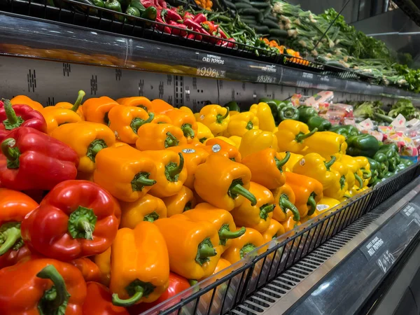 stock image Mill Creek, WA USA - circa March 2023: Close up view of bell peppers for sale inside a Town and Country Market.