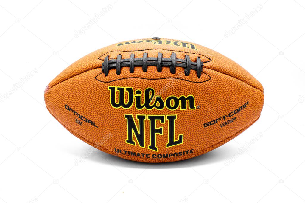 Ocala, Florida Dec 18, 2023 WILSON NFL National Football League pigskin Football official size ultimate composite soft comp leather isolated on white background slightly deflated