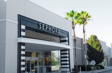 Ocala, Florida US - 20 MAY 2022: Trendy Sephora is a French chain of cosmetic, makeup and perfume stores, featuring nearly 300 brands along with its own private label. outside entrance sign facade clipart