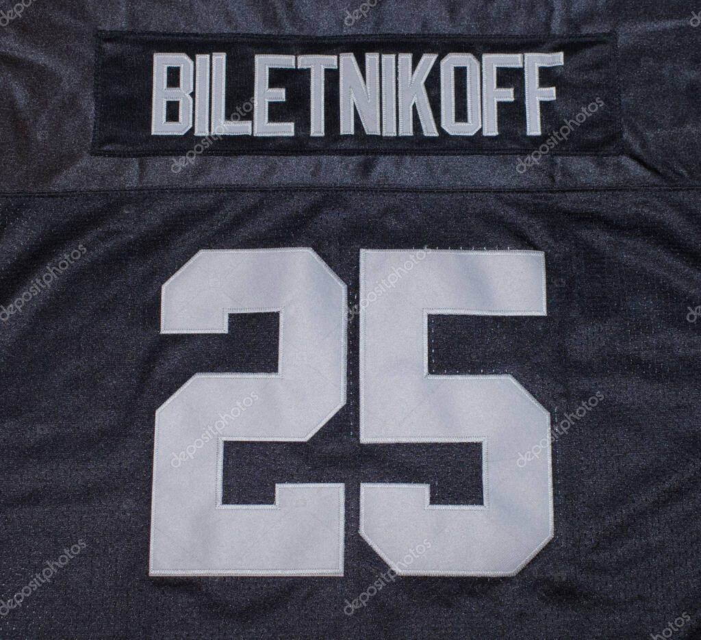 Ocala, Florida USA January 9, 2023 Fred Biletnikoff number 25 jersey with authentic lettering.  Silver and block color hall of fame wide receiver for the Oakland Raiders football team in the NFL