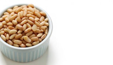 Cannellini bean - Phaseolus vulgaris - named for its resemblance to a human kidney used as an addition to hot and cold salads, side dishes, soups, and even pastas. Isolated on white background clipart