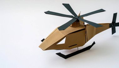 Kara Şahin stili askeri helikopter ve bronz kum renginde tasarım. Askeri savaş konsepti kağıt origami beyaz arka planda kopyalanmış. sanat ve zanaat kavramı