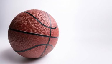 Round orange Basketball Ball with black stripes as used in NBA National basketball association isolated on white background with copy space. clipart