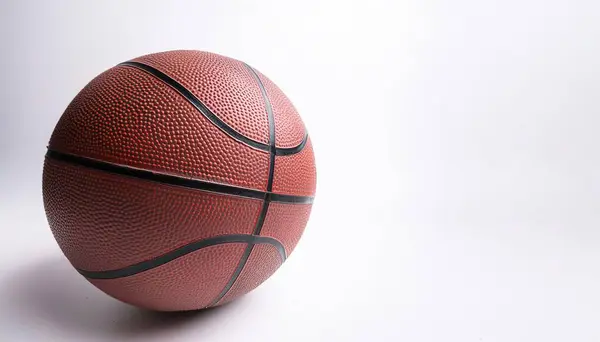 stock image Round orange Basketball Ball with black stripes as used in NBA National basketball association isolated on white background with copy space.