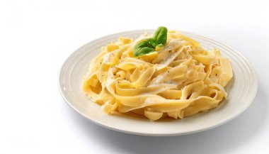 Fettuccine Alfredo is an Italian pasta dish made with fettuccine, butter, and Parmesan cheese. Popular menu item in restaurants throughout the world. Isolated on white background with copy space clipart