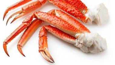 Chionoecetes is a genus of snow, queen or spider crab prepared and eaten as a dish in many different ways all over the world. The legs are usually served in clusters. Isolated on white background clipart