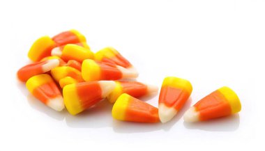 Şeker mısırı, bal, şeker, tereyağı ve vanilya bazlı balmumu dokusuyla üç farklı renge bölünmüş küçük, piramit şeklinde bir şekerdir. Beyaz arkaplanda izole