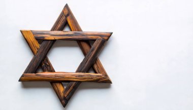 The Star of David is a symbol of both Jewish identity and Judaism. Its shape is that of a hexagram, the compound of two equilateral triangles. Isolated on white background with copy space clipart