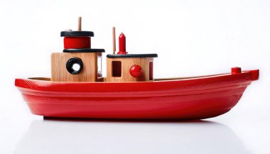 Birleşik Devletler Sahil Güvenlik, ABD Sahil Güvenlik tarafından görevlendirilen gemiler için kullanılan bir terimdir. Kopya alanı olan beyaz bir arkaplanda izole edilmiş. Çocuklar banyo küveti tahta oyuncak.