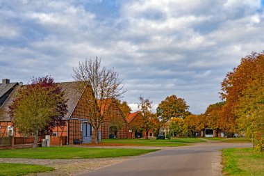 Luechow, Lower Saxony, Germany - 31 October 2021: View of the historic hall houses in the listed Rundling village of Satemin clipart