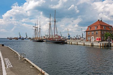 Wismar, Mecklenburg-Vorpommern, Germany - 06 June 2017: View of the harbor of the Hanseatic city of Wismar with sailing ships