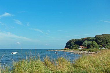 Westerholz, Schleswig-Holstein, Germany - 4 September 2021: View of the vacation resort Westenholz on the Flensburg Fjord in summer