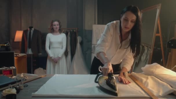 Cinematic Shot Female Tailor Ironing Fabric Stylish Luxury Designer Atelier — Stockvideo