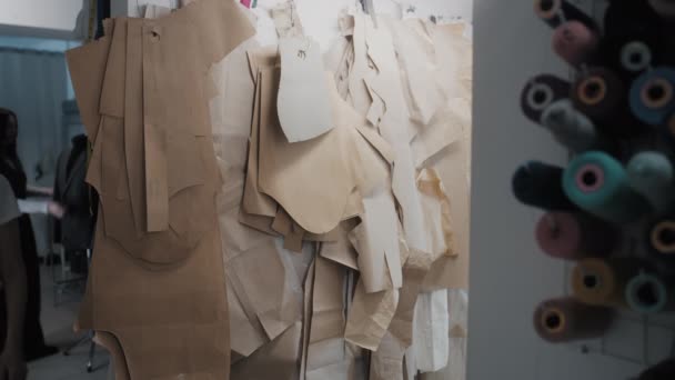 Female Tailor Fashion Designer Chooses Pattern Tailoring New Clothes Collection — Video Stock