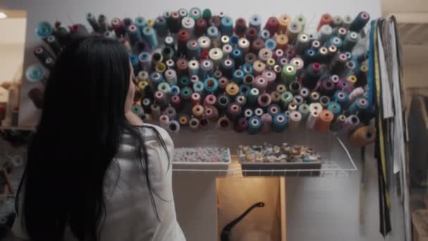 Adult Fashion Designer Tailor Takes Skeins Threads While Working Custom — Stockvideo