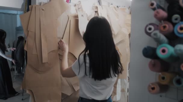 Female Tailor Chooses Pattern Tailoring New Clothes Collection Seamstress Corrects — Video Stock