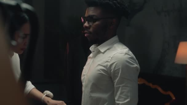 Cinematic Shot Female Tailor Takes Measurements African American Man Wedding — Vídeos de Stock
