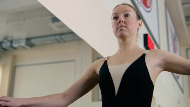 Ballerina Training Bodysuit Stands Ballet Barre Dance Studio Stretches Her — Vídeo de Stock
