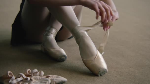 Adult Ballerina Sits Floor Dance Studio Puts Pointe Shoes Choreography — 图库视频影像