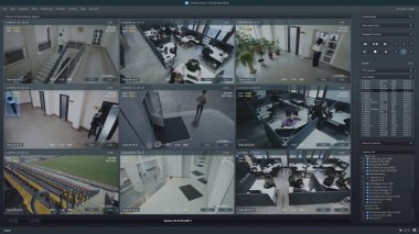 Ofisteki CCTV kameralarını bilgisayar ekranında oynat. Yapay zeka yazılımı ve insan tanıma sistemiyle izleme arayüzü. Güvenlik kameraları. Mahremiyet, kimlik ve takip kavramı.