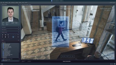 Bilgisayar ekranındaki CCTV kameralarını oynat. Ofis lobisindeki güvenlik kamerası. Yüz tanıma ve kişisel profilleri olan yapay zeka yazılımı. Yüz tarama sistemi. İzleme ve izleme.