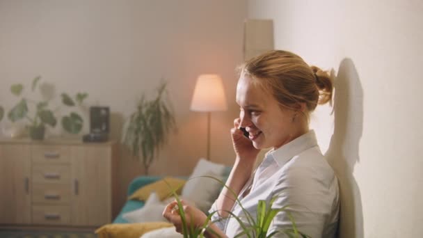 Woman Smiles Talks Phone Neighbor Man Neighbors Love Different Apartments — Stock Video