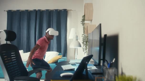 African American Gamer Rides Surf Auged Reality Game Using Headset — Video