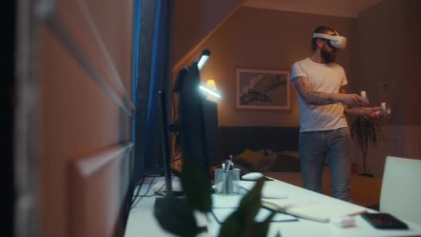 Man Works Remotely Home Using Headset Wireless Controllers Late Night — Stock Video