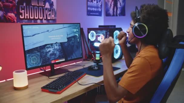 African American Teenage Gamer Headphones Plays Loses Online First Person — Stock Video