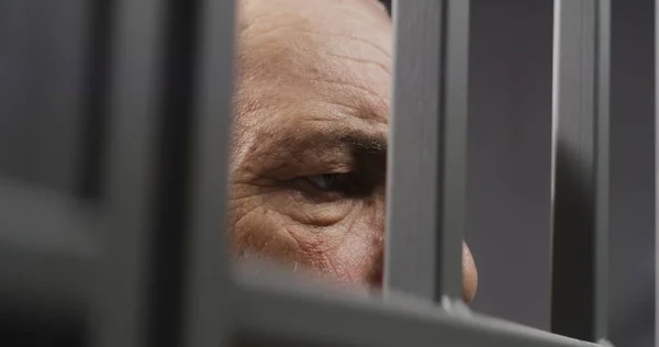 Face Close Depressed Elderly Prisoner Standing Metal Bars Prison Cell — Stock Photo, Image