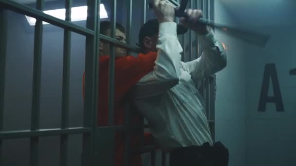 Cinematic Shot Male Prisoner Strangling Prison Officer Taking Keys Opening — Stock video