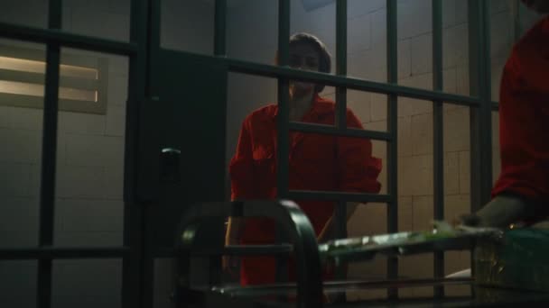 Prisoner Orange Uniform Gives Dinner Food Serving Trolley Female Criminal — Stock Video