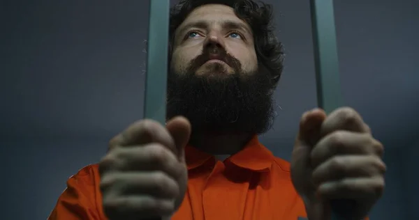 Prisoner Orange Uniform Handcuffs Holds Metal Bars Stands Prison Cell — Stock Photo, Image