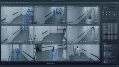 Klinik koridorundaki güvenlik kameralarını bilgisayar ekranında oynat. Yapay zeka fütüristik yazılım ve insan tanıma sistemi ile kullanıcı arayüzü. Güvenlik kamerası görüntüleri. İzleme ve izleme kavramı.