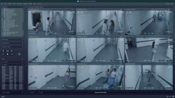在医院的电脑显示屏上播放闭路电视摄像机 监控系统程序的用户界面 医护人员和病人在诊所走廊中行走 监控摄像监测的概念 — 图库视频影像