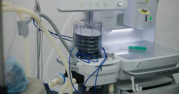 Close up shot of moving pulmoflator during serious surgery in modern medical center. Medical device for artificial lung ventilation. Medical equipment for saving patient lives. Emergency department.