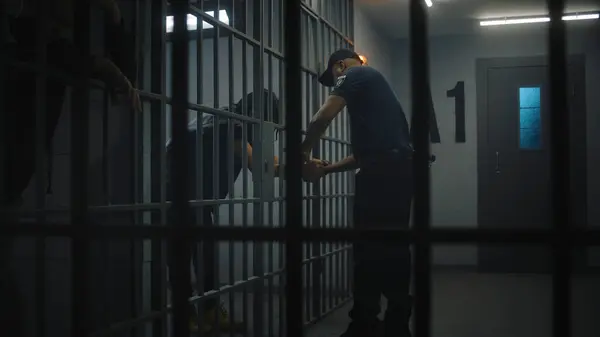 Warden Brings New Prisoner Jail Cell Takes His Handcuffs African — Stock Photo, Image