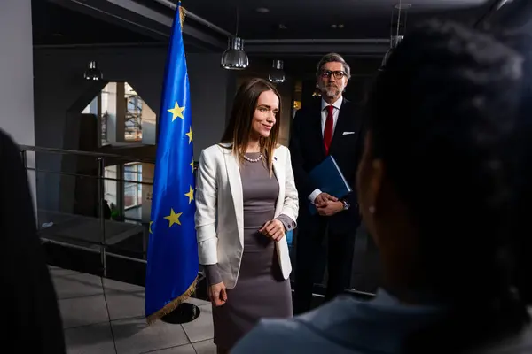 Positive Female Representative European Union Poses Cameras Greets Journalists Correspondents — Stock Photo, Image