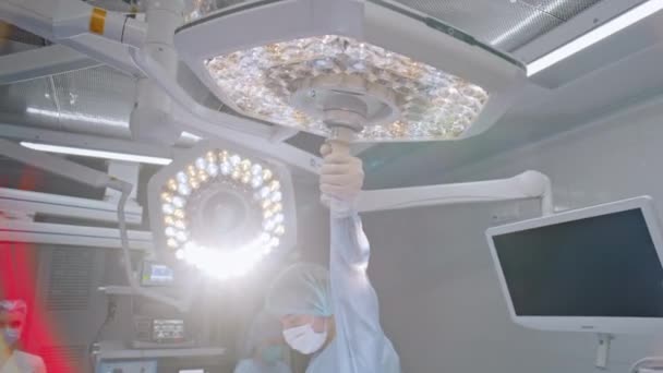 Surgeon Adjusting Surgical Light Operating Room Building Provide Better Illumination — Stock Video